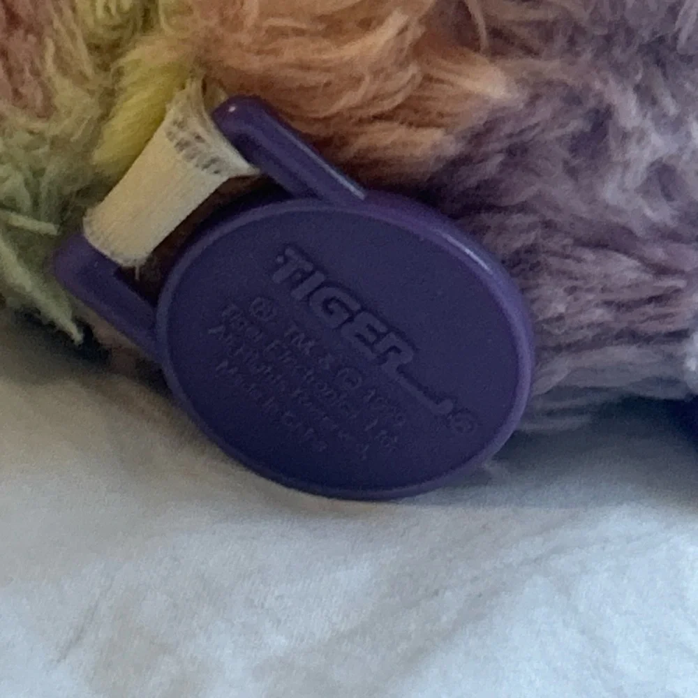 Colorful Plush Bird Toy with Purple Accents